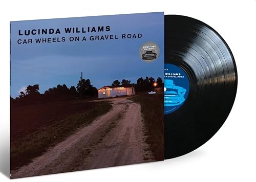 Car Wheels On A Gravel Road
