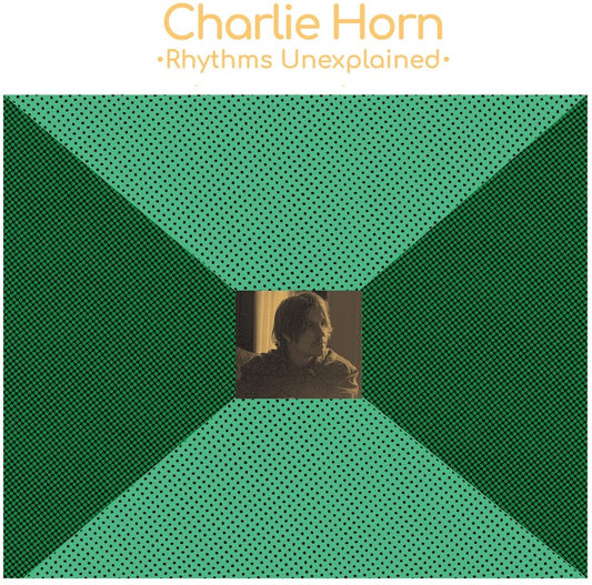 the album cover for Charlie Horn - Rhythms Unexplained