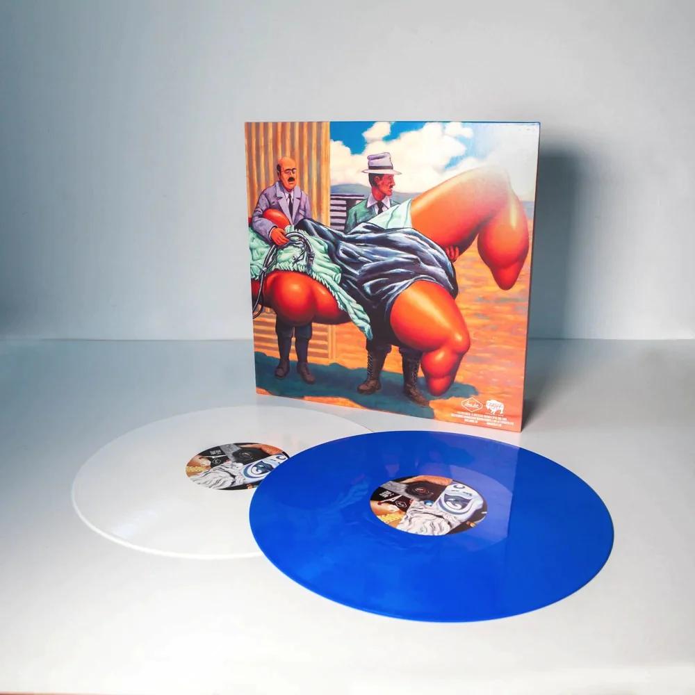 Amputechture (Indie Exclusive, White & Muritz' Blue Colored Vinyl) (2 Lp's)