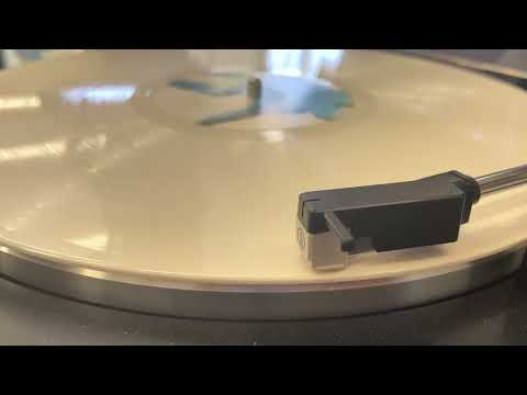 White Vinyl Record Playing 5 Seconds of summer